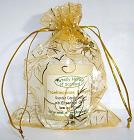  The three wise men Gold organza gift bag,
 with a Frankincense and Myrrh candle in a glass. 